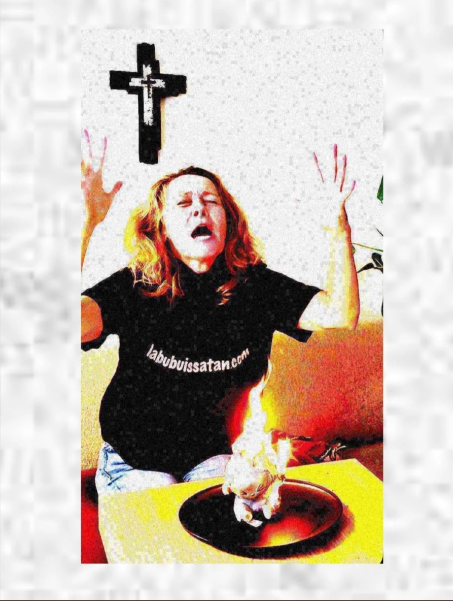 washed out image of a lady in a shirt with the site address raising her hands and making a pained expression while a labubu is on fire on a small dinner plate in front of her